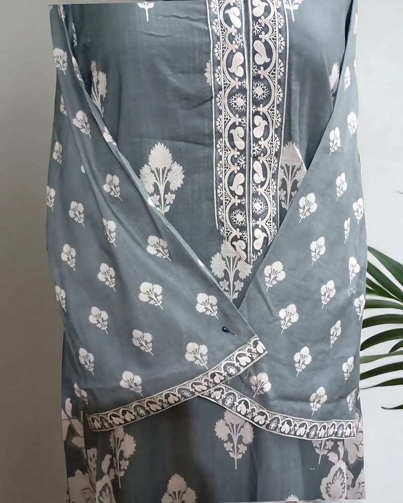 woman wearing a stylish two-piece khadi cotton co-ord set with embroidered wide-leg pants.