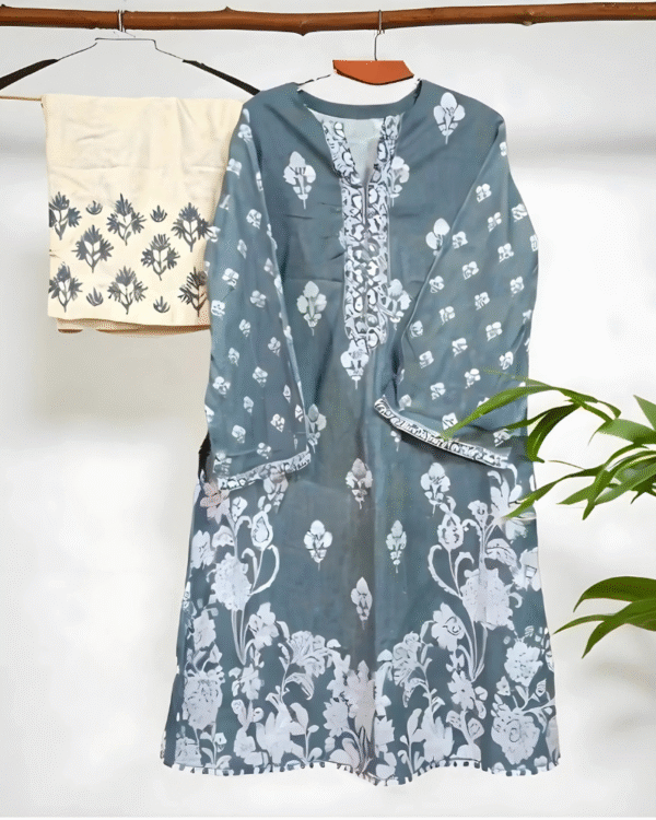woman wearing a stylish two-piece khadi cotton co-ord set with embroidered wide-leg pants. Urban Tapestry Khadi Cotton Co-ord Set