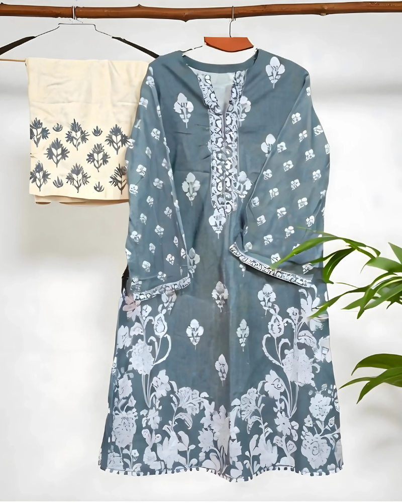 woman wearing a stylish two-piece khadi cotton co-ord set with embroidered wide-leg pants. Urban Tapestry Khadi Cotton Co-ord Set